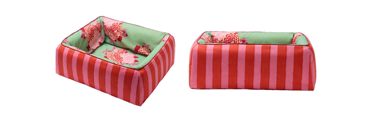 Rectangular pet beds with striped red and pink sides, green floral cushions, shown from both front and side perspectives.