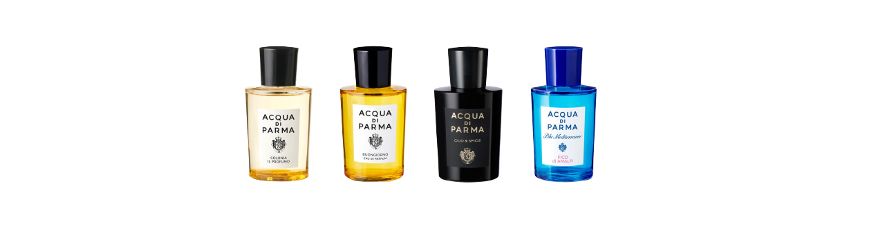 Four Acqua di Parma bottles in a row on a light backdrop: clear with yellow liquid, amber, black, blue; each labeled, black or blue caps.